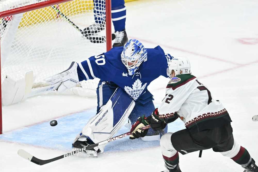 Toronto Maple Leafs goaltender Erik Kallgren makes split save. Kallgren wears a blue and white jersey.